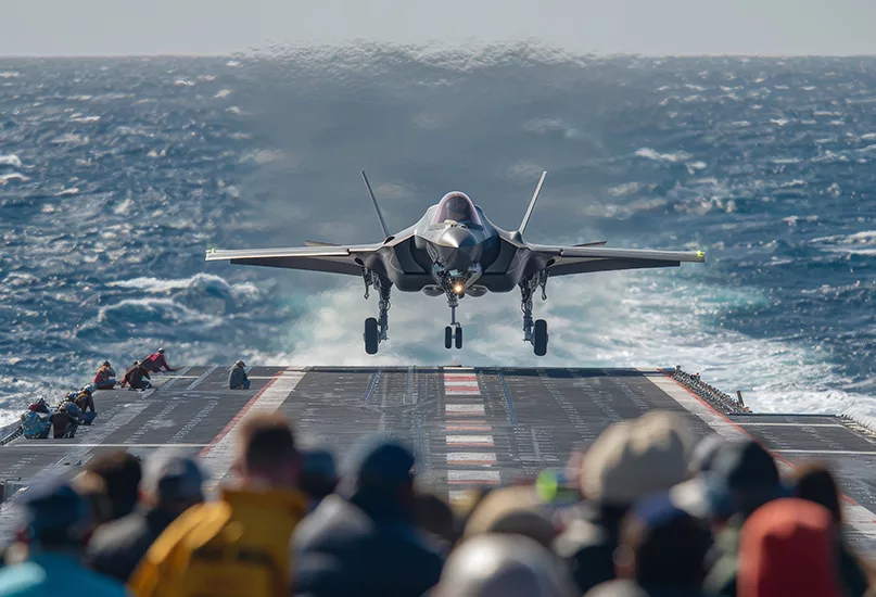 F-35 Lightning II fighter jet on final approach for aircraft carrier landing