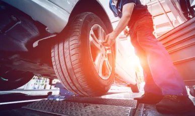 Automotive suspension test and brake test rolls in a auto repair service.