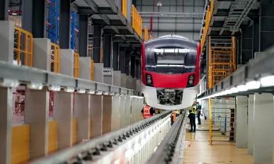 Railway Worker Goes Along Train